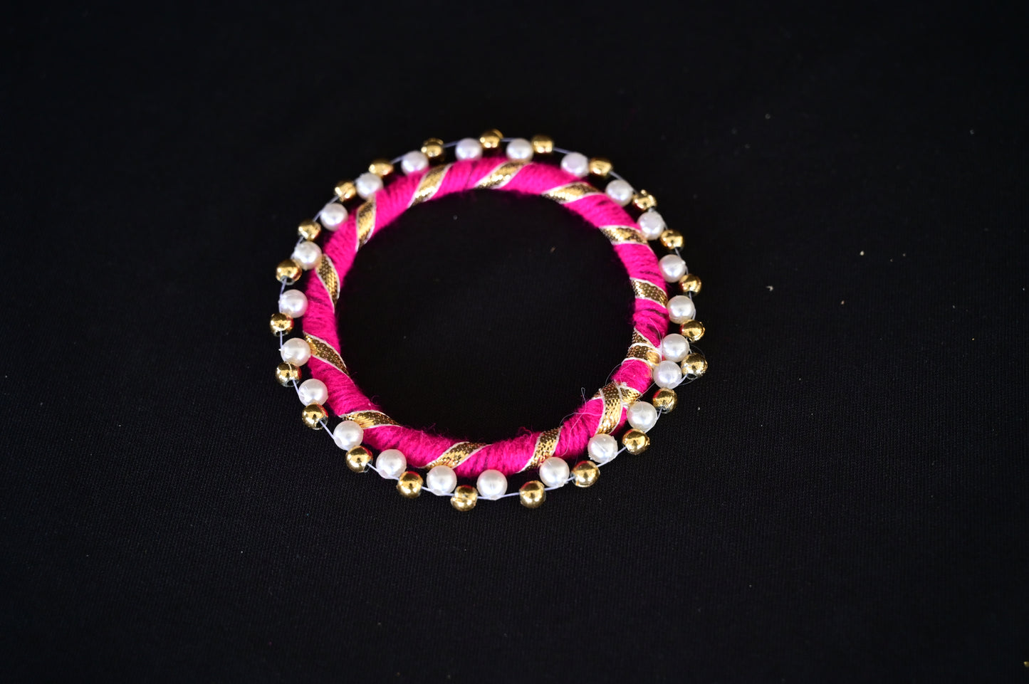 Pink round pearl bangle