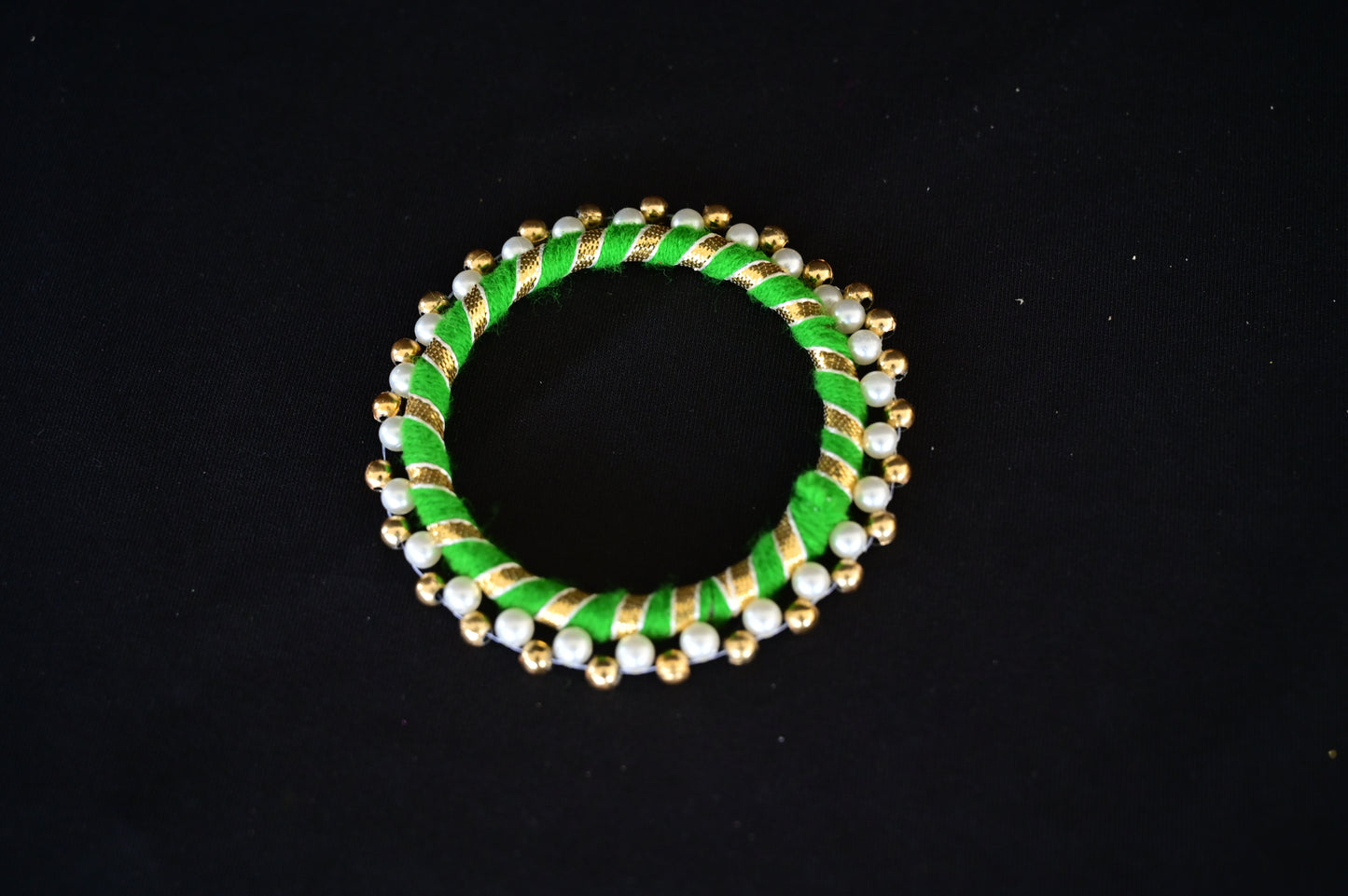 Green round pearl bangle