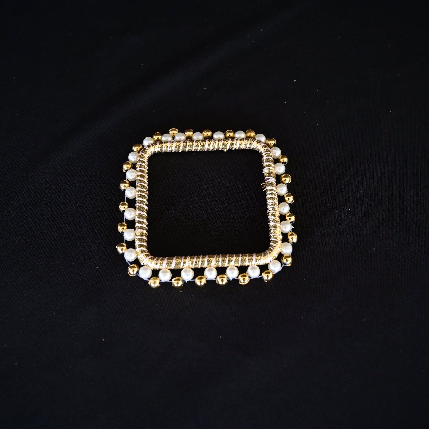 Golden square pearl bangle