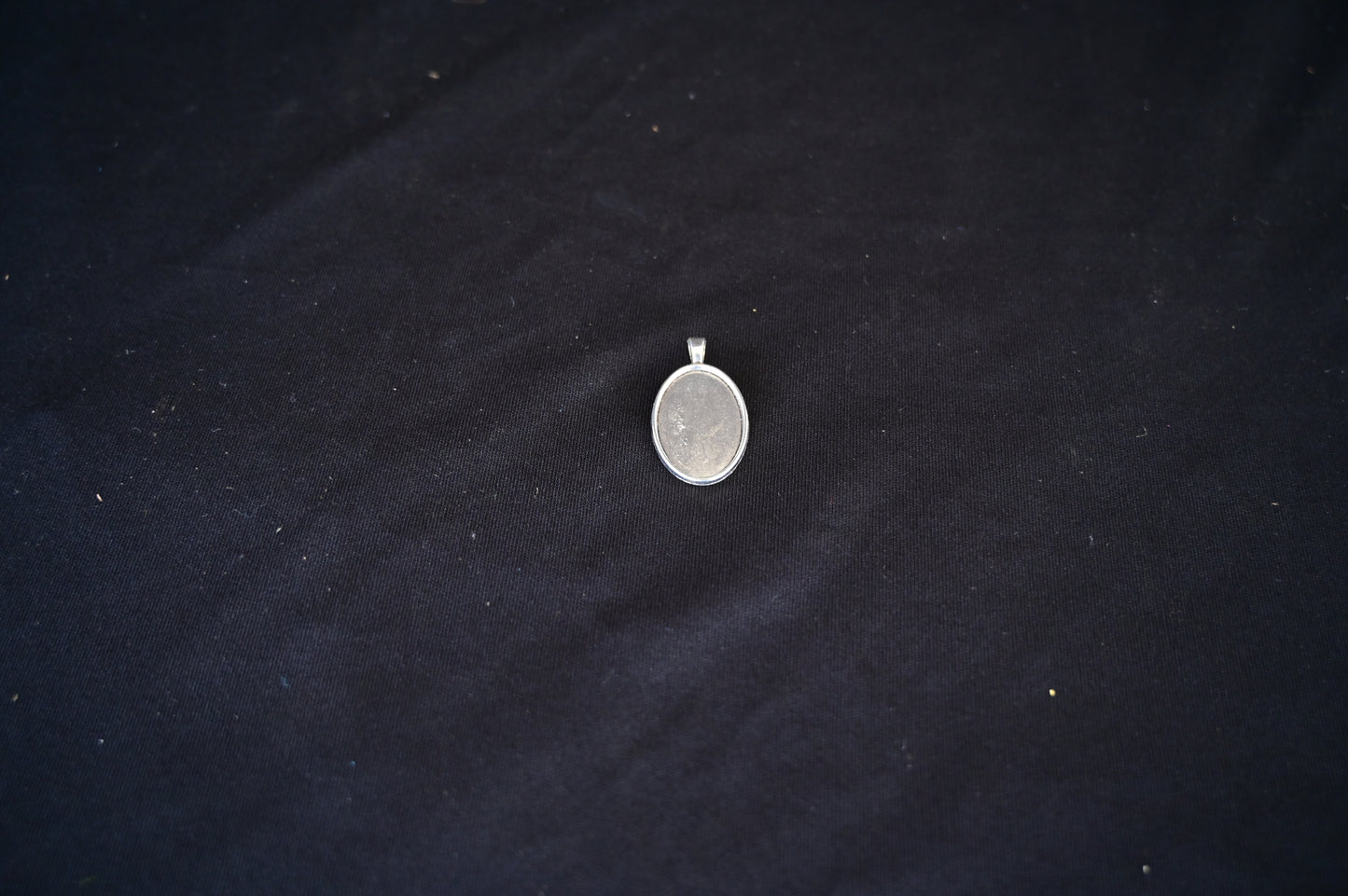 Silver oval bezel