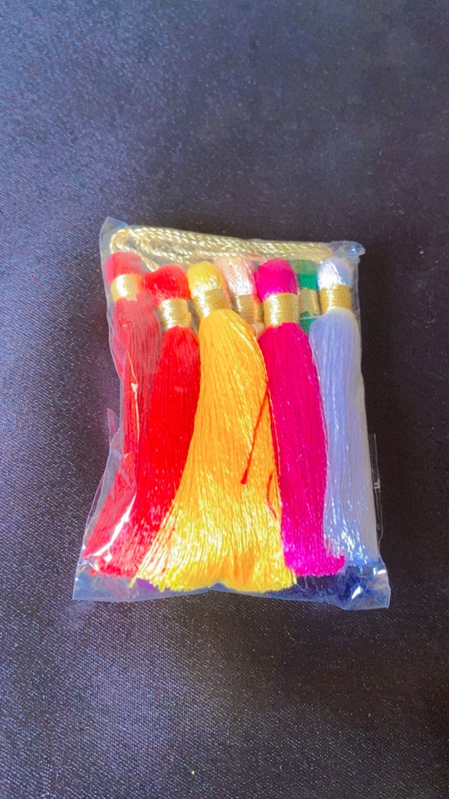 MULTICOLOUR THREAD TASSEL